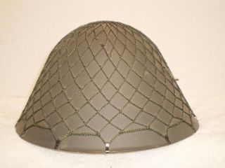 East German DDR m56 helmet with liner and net,  stamped II 9 60 6