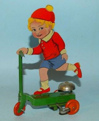 Child On Scooter Tin Windup Toy Japan