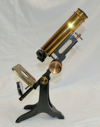 Brass microscope in case dated 1851. 2