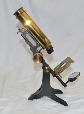 Brass microscope in case dated 1851. 5