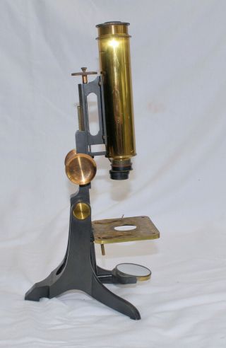 Brass microscope in case dated 1851. 6