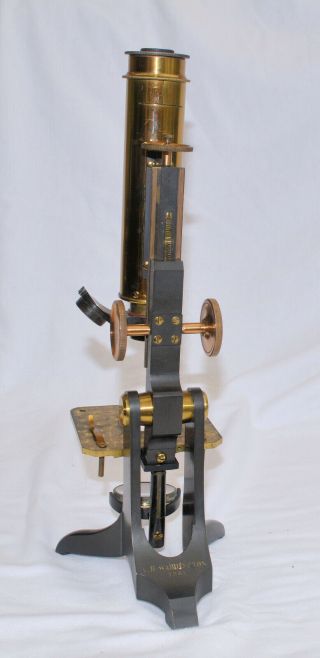 Brass microscope in case dated 1851. 7