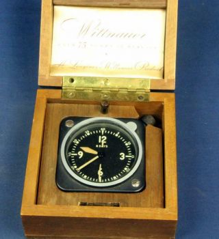 B 815.  WITTNAUER 8 DAY MILITARY CLOCK IN THE BOX.  WATCH IS NOT IN RUN 2