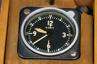 B 815.  WITTNAUER 8 DAY MILITARY CLOCK IN THE BOX.  WATCH IS NOT IN RUN 3