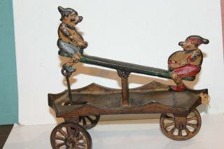 Early Seldom Seen Kenton Cast Iron Elves Articulated See - Saw Pull Toy