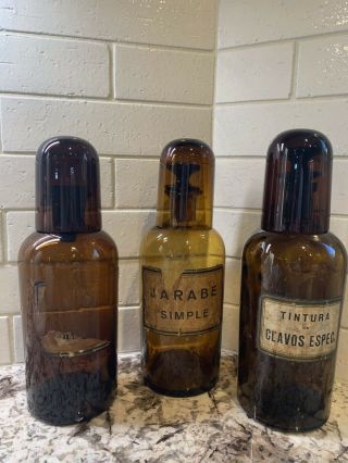Three Antique Vintage Amber Apothecary Pharmacy Syrup Bottles Dispensing Cups