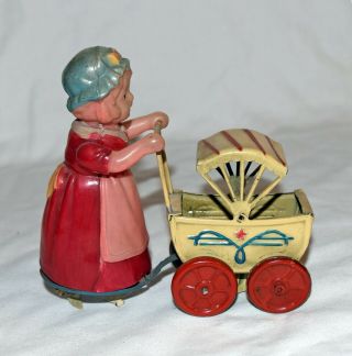 Occupied Japan Celluloid & Tin Girl with Pram - 3