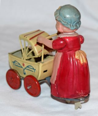 Occupied Japan Celluloid & Tin Girl with Pram - 5