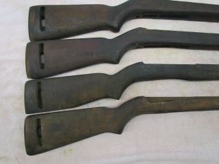 4 USGI US M1 carbine stocks manufacture unknown.  Cracked,  dinged,  scratched WWII 4