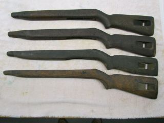 4 USGI US M1 carbine stocks manufacture unknown.  Cracked,  dinged,  scratched WWII 6