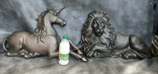 A Good Victorian Cast Iron Lion And Unicorn Figural Decorations