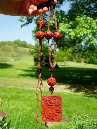 AN ANTIQUE CHINESE CARVED CINNABAR LACQUER PENDANT & BEADS NECKLACE 8