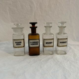 Antique Apothecary Bottles Four Whiskey Brandy Bicarb Soda And Hydrogen Pero