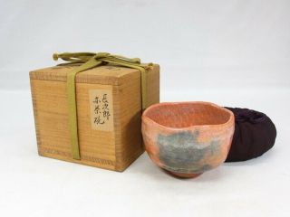 E959: Japanese pottery tea bowl of AKA - RAKU with appraised box of great RYONYU 12