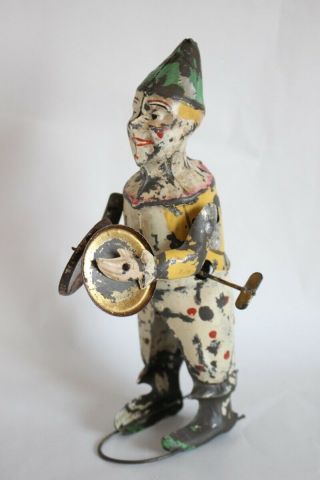 Antique Germany G.  Staudt Clown Playing Cymbals Hand Painted Tin Toy Gunthermann