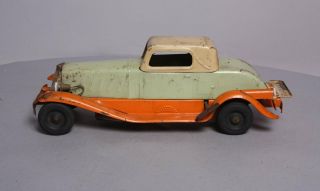 Girard Pressed Steel Deluxe Coupe Wind - Up Toy