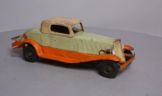 Girard Pressed Steel Deluxe Coupe Wind - Up Toy 6