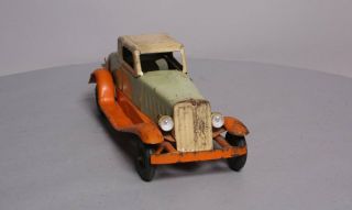Girard Pressed Steel Deluxe Coupe Wind - Up Toy 7