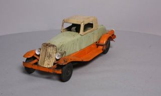 Girard Pressed Steel Deluxe Coupe Wind - Up Toy 8