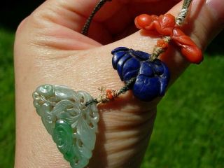 TWO STRINGS OF ANTIQUE CHINESE JADEITE,  RUBY,  CORAL,  LAPIS & SEED PEARL PENDANTS 11