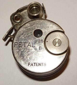 Petal Sub Miniature Round Camera,  Occupied Japan