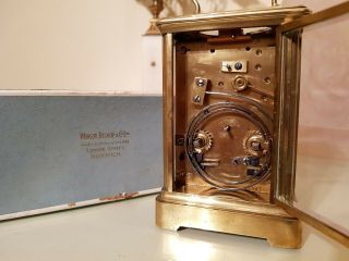 An Edwardian Brass Striking Carriage Clock By Hamilton & Co,  London.