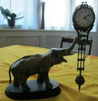 Antique German Junghans Elephant Swinging Arm Clock