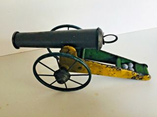 Vintage Tin Cannon,  Iron Wheels,  Cannon Balls.