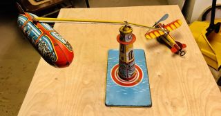 Unique Art Sky Ranger Tin Litho Wind Up Toy Circa Tin Litho Wind Up Toy