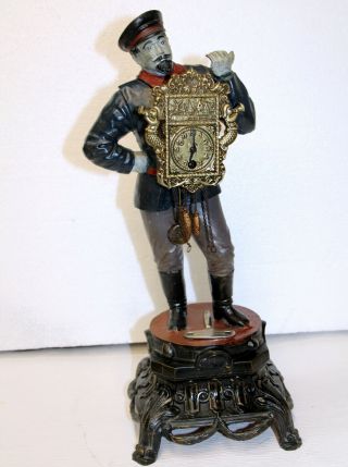 Old Table Clock,  Dutch Clock In Metal The Man Of The Hour