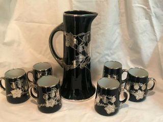 Lenox Cobalt Blue Porcelain And Silver Overlay Drink Set.  Pitcher And Six Mugs.