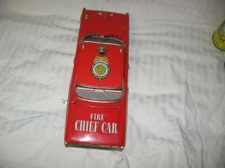 Vintage toy T.  N.  Fire chief car friction no.  one.  Made in Japan in the 1950s 6