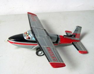 Vintage Japan Usagiya Cessna 180 Tin Litho Friction Toy Airplane