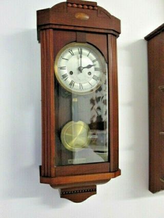 A Mahogany Wurttemberg Chiming Wall Clock
