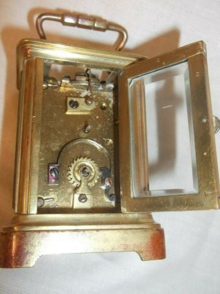 TINY MINIATURE FRENCH MANTLE CLOCK,  STANDS JUST 2.  75 INCHES,  FOR REPAIR, 6