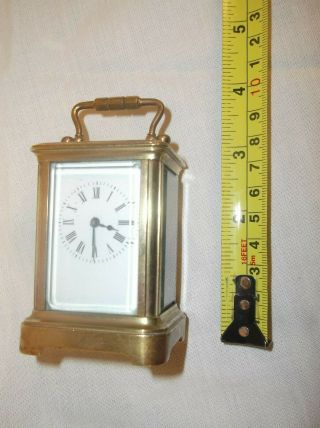 TINY MINIATURE FRENCH MANTLE CLOCK,  STANDS JUST 2.  75 INCHES,  FOR REPAIR, 7