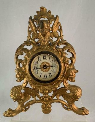 Antique Iron Clock Cherub Face & Griffins 10 " X 8 " Shelf Mantel Figural
