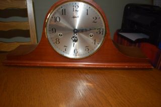 German Hermle 8 Day Wooden Triple Chime Mantle Clock.