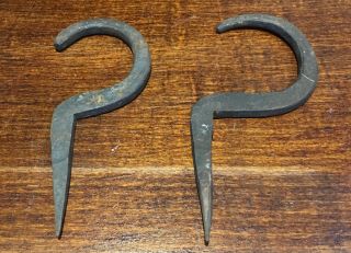 Two Antique Primitive Hand Forged Wrought Iron Hooks