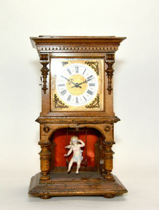 Antique German Animated Porcelain Boy On Swing Pendulum Column Side Mantle Clock