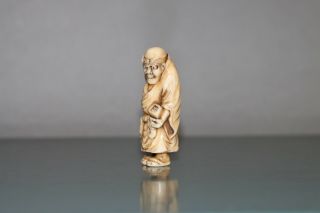 Antique Japanese Netsuke Samurai throws sacred beans driving away demons. 7