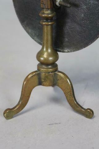 A RARE LATE 18TH C BRASS CANDLE REFLECTOR IN THE SHAPE OF A TILT TOP TEA TABLE 8