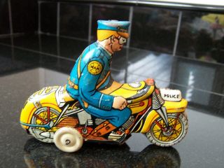 Lithographed Tin Wind Up Policeman On Motorcycle,  Toy,  Marx