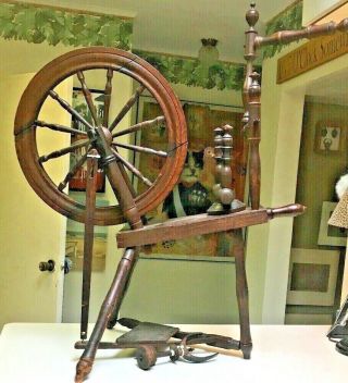 Antique spinning wheel engraved 