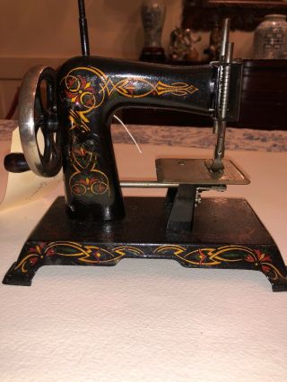 Antique Casige Toy Sewing Machine Hand Crank Black Red Gold Floral Germany
