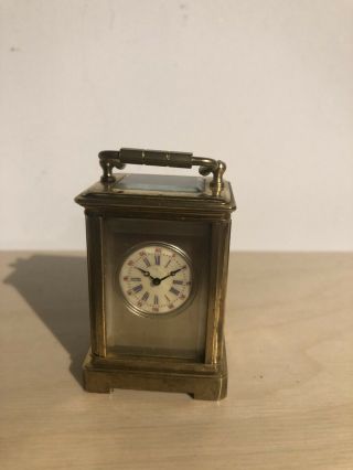 Miniature Carriage Clock With Porcelain Panels Decorated With Cherubs