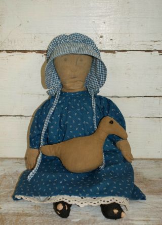 early cloth rag doll with her duck,  on old body,  early blue calico fabric 3