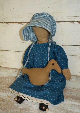 early cloth rag doll with her duck,  on old body,  early blue calico fabric 5