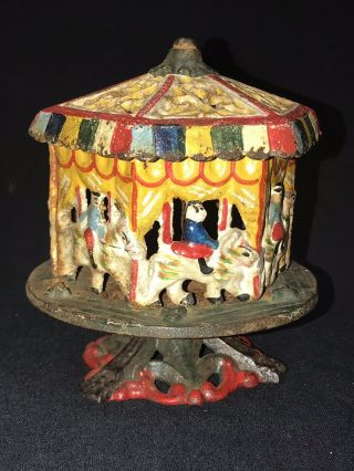 Antique Painted Cast Iron Toy Carousel Merry Go Round Mechanical Bank