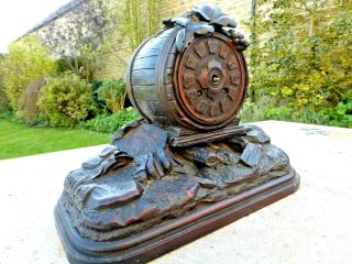 RARE ANTIQUE BLACK - FOREST CARVED MANTEL CLOCK.  not cuckoo 4